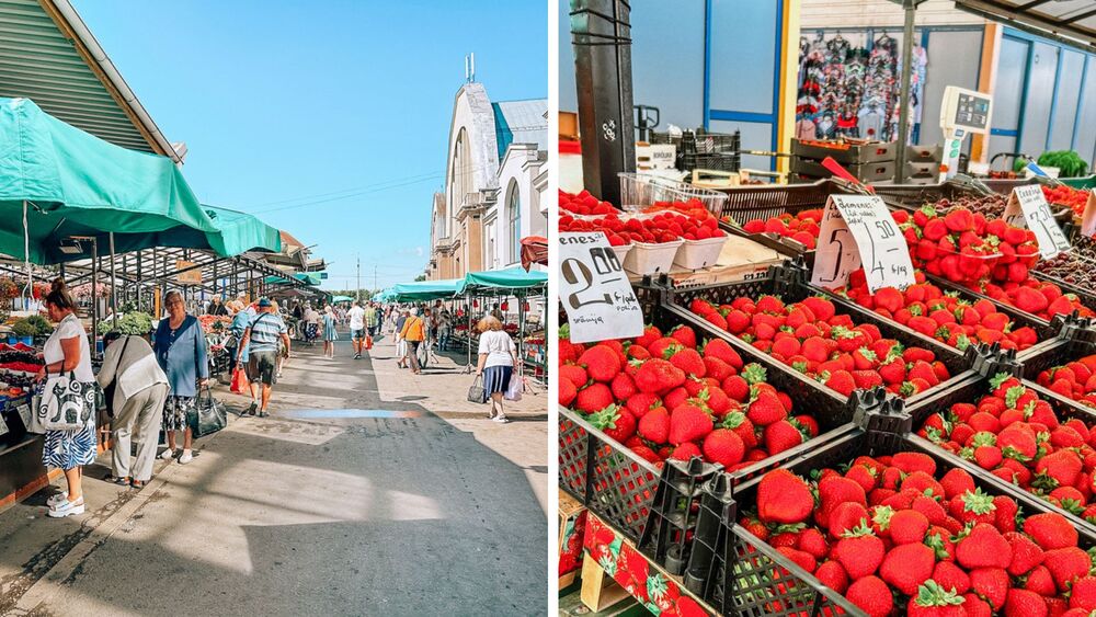 Vista del mercato centrale, nello sfondo l'ex hangar per la costruzione di dirigibili tedeschi Zeppelin durante la Prima Guerra Mondiale e cassette di fragole appena raccolte esposte al mercato